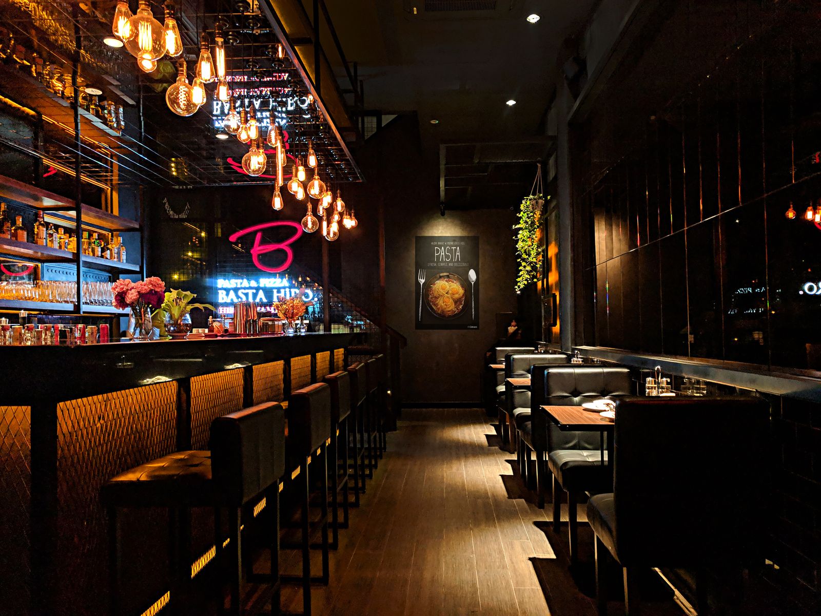 The dining room at Olive & Ember after dark